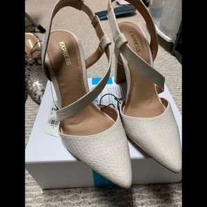 asymmetrical strappy closed toe pumps